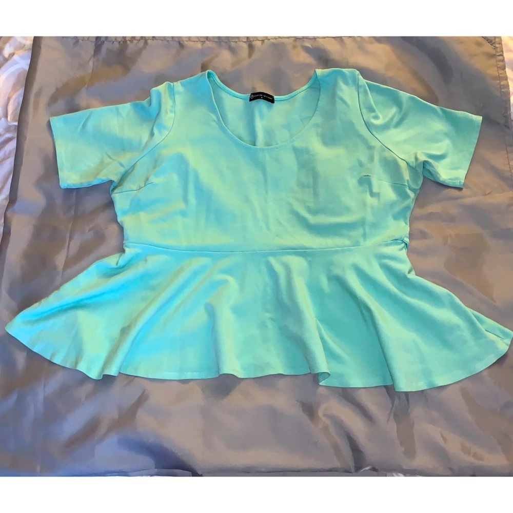 Peplum top with attached belt